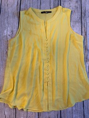 Cute woman’s sleeveless top. Fresh lightweight fabric. Great for summer days